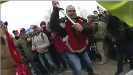  ?? METROPOLIT­AN POLICE DEPARTMENT, FILE ?? Thomas Webster, in red jacket, at a barricade line at on the west front of the U.S. Capitol on Jan. 6, 2021 in Washington.