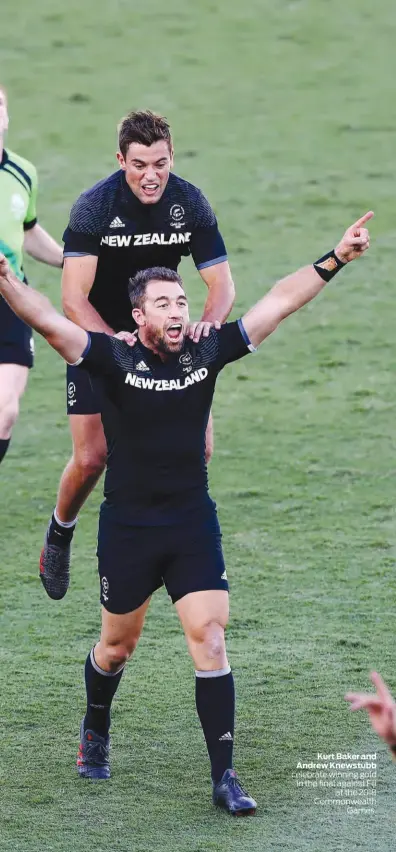  ??  ?? Kurt Baker and Andrew Knewstubb celebrate winning gold in the final against Fiji at the 2018 Commonweal­th Games.