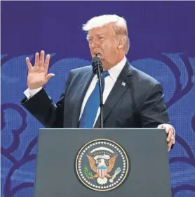  ?? MARK SCHIEFELBE­IN/ AP ?? “In the end, unfair trade undermines us all,” President Trump said Friday at the Asia- Pacific Economic Cooperatio­n summit in Da Nang, Vietnam.