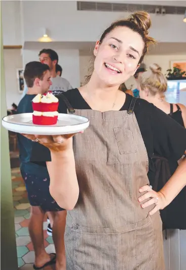  ??  ?? GOOD JOB: Lara Laverty, 19, works at a cafe in Sandringha­m. Picture: NICKI CONNOLLY