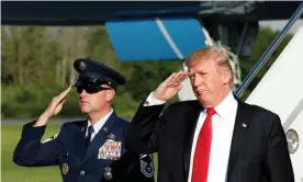  ??  ?? President Trump salutes as he arrives at Morristown airport in New Jersey last week. Photograph: Yuri Gripas/Reuters