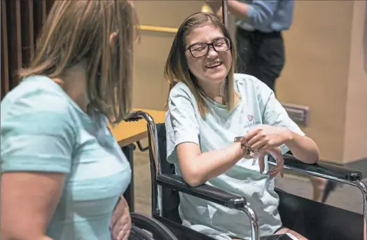  ?? Alex Driehaus/Post-Gazette ?? Morgan Yoney of Waynesburg, right, talks to her mother and kidney donor, Tammy Yoney, before a news conference Friday at UPMC Montefiore.