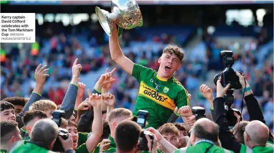  ?? BRENDAN MORAN/SPORTSFILE ?? Kerry captain David Clifford celebrates with the Tom Markham Cup