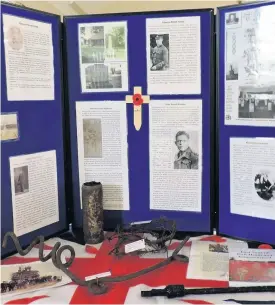  ??  ?? Display by the Wall Heath and Kingswinfo­rd War Memorial Group