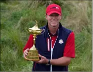  ?? ASHLEY LANDIS — THE ASSOCIATED PRESS ?? Team USA captain Steve Stricker poses with the trophy after the Ryder Cup matches at the Whistling Straits Golf Course on Sept. 26 in Sheboygan, Wis.