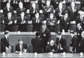  ?? (REUTERS/Tingshu Wang photo) ?? Chinese President Xi Jinping leaves at the end of the closing ceremony of the 20th National Congress of the Communist Party of China, at the Great Hall of the People in Beijing, China October 22, 2022.