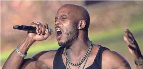  ?? SCOTT GRIES, GETTY IMAGES ?? DMX performs at The Source Hip-Hop Music Awards 2001 at the Jackie Gleason Theater in Miami Beach, Florida.