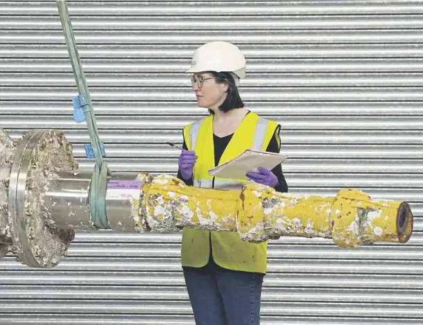  ?? ?? Dr Ellie Swinbank with part of the Meygen tidal turbine, acquired by NMS, main; Dr Faisal Ghani and the Solariskit he developed to heat water using solar power, left; sustainabl­e fashion from Phoebe English, right