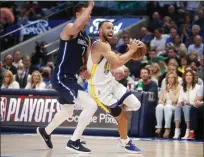  ?? NHAT B. MEYER — BAY AREA NEWS GROUP ?? Golden State Warriors' Stephen Curry (30) dribbles against Dallas Mavericks' Dwight Powell (7) in the first quarter of Game 3of their NBA Western Conference Finals playoff game at the American Airlines Center in Dallas, Texas, on Sunday.
