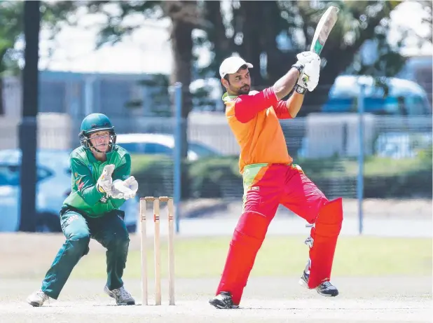  ?? Picture: BRENDAN RADKE ?? PLAYMAKER: Cassowary Coast's Vikramjeet Singh Bains puts in a solid hit against the Cairns Rovers at Griffiths Park, Manunda.