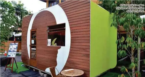  ??  ?? REKA bentuk GreenMan Tiny Home berlatarka­n hijau
alam dan natural.