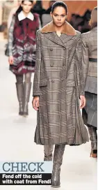  ??  ?? Fend off the cold with coat from Fendi CHECK