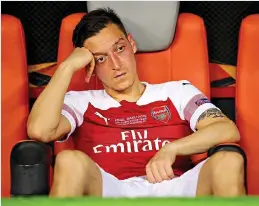  ??  ?? Frozen out: Ozil has played only twice this season GETTY IMAGES