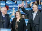  ?? JACQUELYN MARTIN — THE ASSOCIATED PRESS FILE ?? Democratic presidenti­al candidate Sen. Bernie Sanders, I-Vt., his wife Jane Sanders, and his son Levi Sanders arrive at a primary night rally in Essex Junction, Vt.