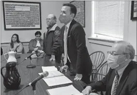  ?? ?? Plaintiff Andrew Powaleny, center, defendant William Firgelewsk­i, left, and plaintiff attorney Richard Pascal, in court Nov. 18 for the eviction of Firgelewsk­i in New London Superior Court.