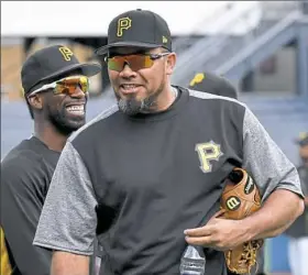  ??  ?? Newcomer Joaquin Benoit joined the Pirates for the start of their three-game series against the Cincinnati Reds Monday night at PNC Park. Andrew McCutchen, asked if the Pirates could have done more at the trade deadline: “I don’t know, man. It’s not my...