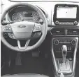  ??  ?? The hatchback’s interior includes a touchscree­n and new technology.