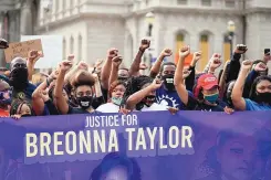  ?? DARRON CUMMINGS/ASSOCIATED PRESS ?? Black Lives Matter protesters march in Louisville, Kentucky, on Friday. Hours of material from the grand jury proceeding­s for Taylor’s fatal shooting by police have been made public..