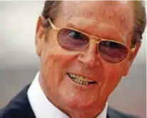  ??  ?? This is a Saturday, July 2, 2011 file photo of British actor Sir Roger Moore as he arrives at the Monaco palace for the religious wedding ceremony of Prince Albert II of Monaco and Charlene Princess of Monaco.