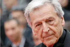  ??  ?? This file photo shows Greek director Costa-Gavras as he arrives for the screening of the film “Ma Loute (Slack Bay)” at the 69th Cannes Film Festival in Cannes, southern France.