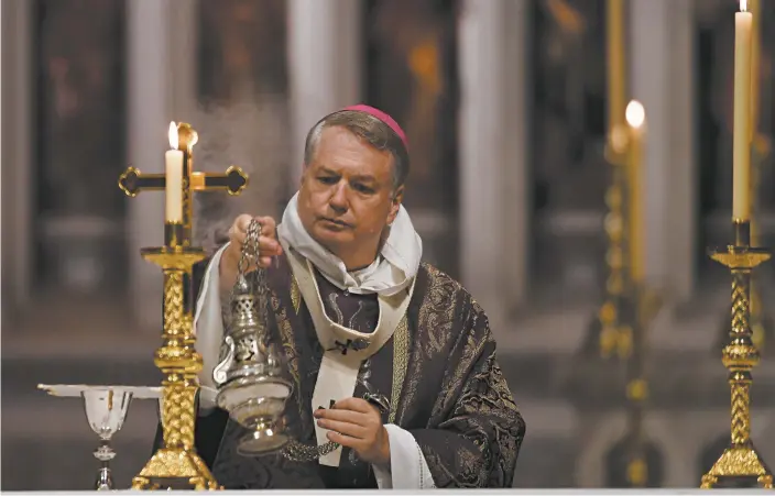  ?? AAP / Bianca De Marchi ?? The Catholic Archbishop of Sydney, Anthony Fisher, during a mass at St Mary’s Cathedral, Sydney.