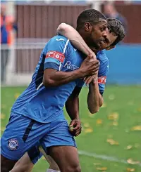  ?? Danny Wood ?? Domaine Rouse celebrates the opening goal for Ramsbottom