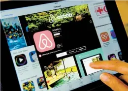  ?? JOHN MACDOUGALL AFP VIA GETTY IMAGES ?? Airbnb and other third-party settlement organizati­ons will be sending far more Form 1099-Ks to the IRS and to their customers in January 2023.