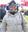  ?? ?? Portia Dube smiles after winning two Nissan NP200 vehicles sponsored by CABS and Arenel