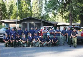  ?? CONTRIBUTE­D PHOTO BY MICHAEL BELEF ?? Members of the Bear Ridge Sequoia fire unit pose for a photo at the Summit Ranger Station near Strawberry, CA. Wednesday, July 25.