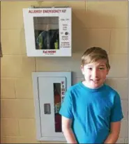  ?? CHAD FELTON — THE NEWS-HERALD ?? Sixth-grader and allergy awareness advocate Aiden Nainiger not only worked to get EpiPens introduced to Madison Middle School, but also to his previous school, South Elementary.