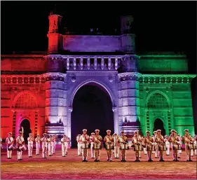  ?? REUTERS ?? Navy soldiers demonstrat­e their skills as they play drums in front of the Gateway of India during a rehearsal ahead of Navy Day celebratio­ns in Mumbai, on Saturday.
