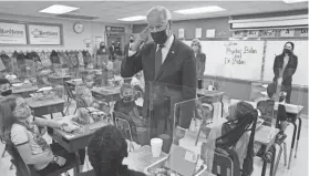  ?? EVAN VUCCI/AP ?? President Joe Biden, shown visiting Yorktown (Va.) Elementary School on Monday, is pushing a package of education and safety-net programs for families.