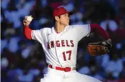  ?? ASHLEY LANDIS / AP ?? Shohei Ohtani agreed Dec. 9 to a record $700 million, 10year contract with the Dodgers, but the majority, $680 million, will be payable from 2034-43.