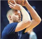  ?? MARK WEBER, THE COMMERCIAL APPEAL ?? Memphis Grizzlies forward Chandler Parsons warms up before taking on the Atlanta Hawks in their home-opener at the Fedexforum in Memphis on Oct.19.