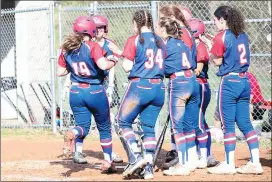  ?? Photo by Becky Polaski ?? Members of the St. Marys Area Lady Dutch softball team wait to celebrate with Giuliana Muccio as she rounds the bases after her home run in the second inning.