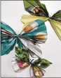  ?? CONTRIBUTE­D ?? DPS students created paper butterflie­s out of magazine pages.