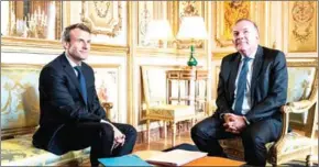  ?? ETIENNE LAURENT/AFP ?? French President Emmanuel Macron (left) meets with the head of the employers federation MEDEF, Pierre Gattaz, in Paris yesterday.