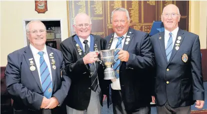  ??  ?? Well done Triples winners James Allison with Paisley Veterans Bowling Associatio­n president Alex Watson, Alan Peacock and Thomas McGrath of Charleston Bowling Club