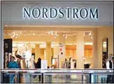  ?? (AP) ?? Shoppers walk near an entrance to a Nordstrom store at a shopping mall in Pittsburgh on Wednesday, Feb. 24, 2021.