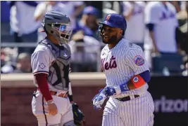  ?? JOHN MINCHILLO – THE ASSOCIATED PRESS ?? Robinson Cano, right, who was designated for assignment and ultimately released by the Mets on Sunday, was batting just .195with one homer in 43plate appearance­s this season.