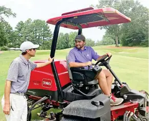  ??  ?? Old Waverly Golf Club Assistant Golf Superinten­dent Zak Holloway, at left, and golf course laborer Gill Wilkerson have been busy preparing the golf course for the United States Golf Associatio­n’s 2019 U.S. Women’s Amateur Championsh­ip. Wilkerson is among seven former, current and future students of East Mississipp­i Community College’s Golf & Recreation­al Turf Management students who will be working during the event. (Submitted photo)