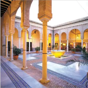  ?? COURTESY PARADORES OF SPAIN ?? Paradores of Spain, a chain of inns lodged in historic buildings, is featuring discounts of about 25 percent at its properties. Above, the Parador Carmona in Seville.