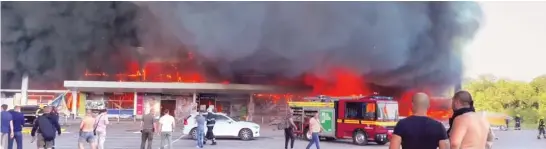  ?? PHOTO:TWITTER ?? A Russian missile strike hit a crowded shopping centre with 1000 people in it, in the central Ukrainian city of Kremenchuk on Monday, killing at least two people and wounding 20, senior Ukrainian officials said. Footage circulated by President Volodymyr Zelenskiy showed a huge blaze raging in the mall