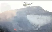  ?? PHOTO: WILLEM LAW ?? Firefighte­rs have been called in from across the country to help put down the raging fires on the Cape Peninsula.