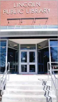  ??  ?? Front door of the new Lincoln Public Library, located on the downtown square.