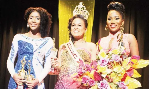  ??  ?? Queen Aquaila Rupan is flanked by first and second runners-up Younette Stepheny and Gabriella Chapman respective­ly.