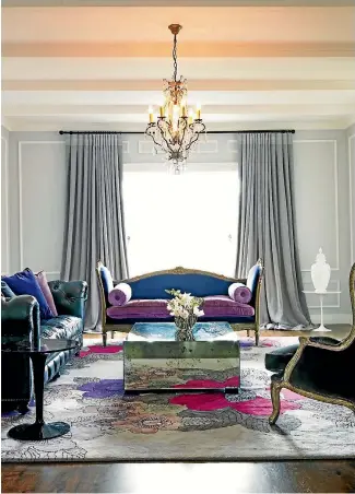  ?? NZ HOUSE AND GARDEN ?? Long curtains that ‘‘puddle’’ on the floor add a sense of drama and luxury.