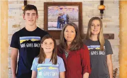  ?? COURTESY OF JESSE ZURETTI ?? Members of the Cook family of Corrales — from left, Ryan, 16; Sara, 11; mother Maureen; and Kate, 19 — wear the T-shirts that will be available for sale starting Sunday to raise funds for the Dave Gives Back initiative.