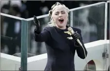  ??  ?? Lady Gaga sings the national anthem during the 59th Presidenti­al Inaugurati­on at the U.S. Capitol.