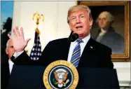  ?? AP PHOTO BY MANUEL BALCE CENETA ?? In this March 23 photo, President Donald Trump speaks in the Diplomatic Room of the White House in Washington.